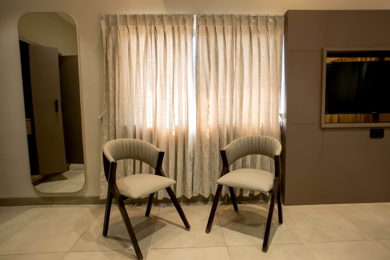 Guest room seating area at The MB Resort