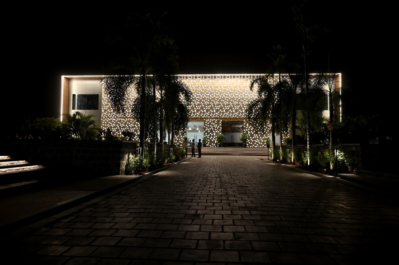 Illuminated exterior at The MB Resort