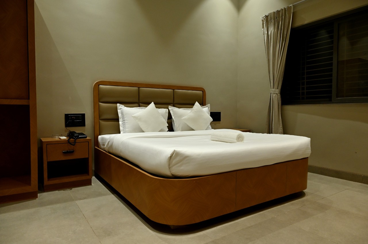 Bedroom at night at The MB Resort